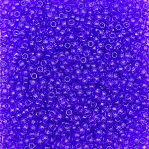 A close-up of numerous small blue beads densely packed together.
