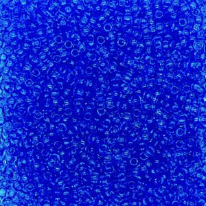 Abstract blue painting with intricate swirling patterns.