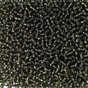Close-up of small black cylindrical pellets.