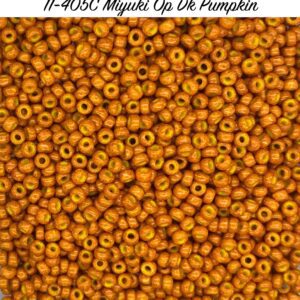 Close-up of numerous small orange Miyuki seed beads labeled 11-805C Pumpkin.