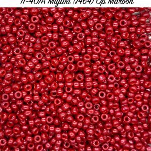 Close-up of numerous small red beads scattered densely.