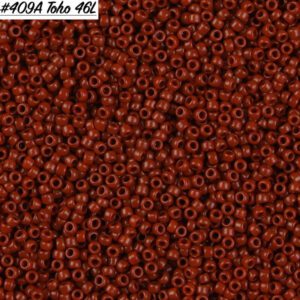 Close-up of numerous small, round, reddish-brown beads.