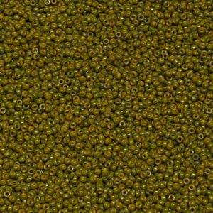 Close-up of small green beads densely packed together.