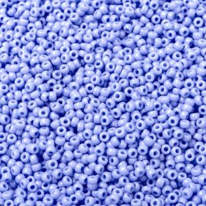 Close-up of numerous small blue beads scattered densely.
