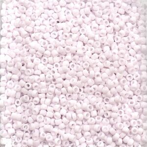 Small white plastic beads densely packed together.