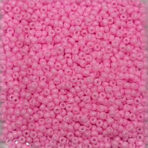 A close-up of numerous small pink beads.