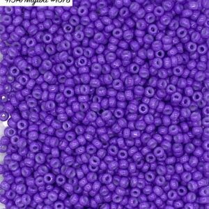 Close-up of numerous small purple beads.