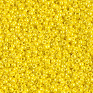 A close-up of numerous small yellow beads.