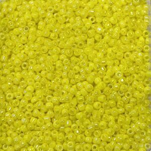 Close-up of small yellow beads densely packed together.