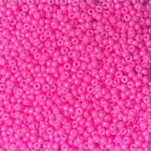 Bright pink small beads closely packed together.