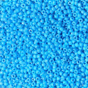 A close-up of numerous small, shiny blue beads.