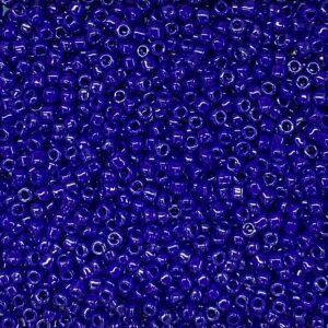 Close-up of numerous small, shiny blue beads.