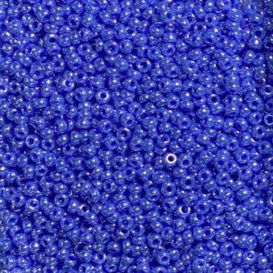 Close-up of numerous small blue beads densely packed together.