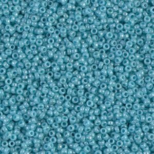 Close-up of numerous small blue beads.