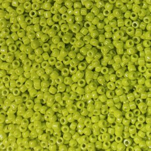 Close-up of numerous small lime green beads.