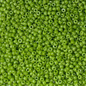 Close-up of numerous small green beads.