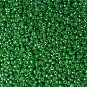 Close-up of numerous small green beads.
