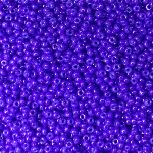 Close-up of numerous small, round, purple beads.