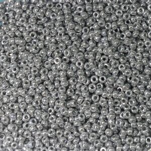 A close-up of numerous small, metallic silver beads.