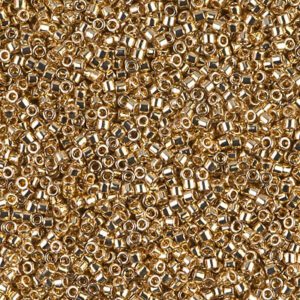 Close-up of tiny golden beads densely packed together.