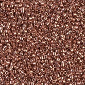 Close-up of small copper-colored beads densely packed together.