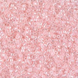 Close-up of small pink translucent beads.