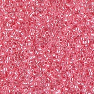 Close-up of small pink and white beads scattered densely.