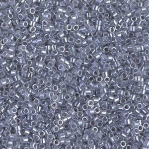 Close-up of many small transparent beads with a silver core.