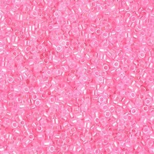 Close-up of numerous small pink plastic beads.