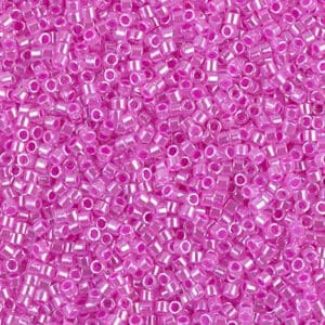 Bright fuchsia seed beads with silver-lined holes