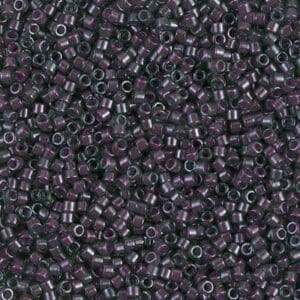Close-up of small, dark purple glass beads.
