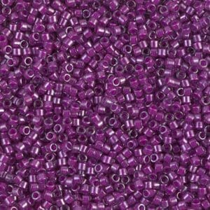 Translucent fuchsia glass seed beads