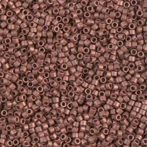 Small cylindrical brown beads arranged closely together.