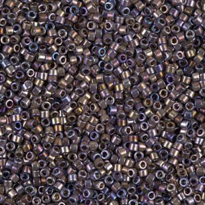 Close-up of tiny metallic beads with a shiny finish.