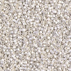 Close-up of numerous tiny, translucent beads with a pearly sheen.