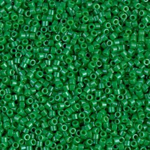 Close-up of small, shiny green beads scattered densely.