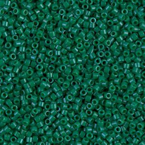 Close-up of small green seed beads.