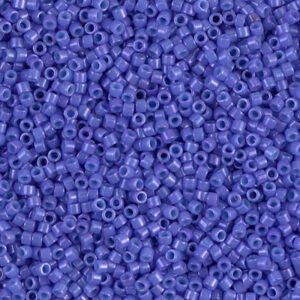 Close-up of numerous small purple beads scattered together.