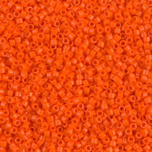 Close-up of numerous small orange beads.