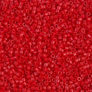 Close-up of numerous small red beads with a shiny surface.