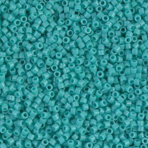 Close-up of tiny turquoise plastic beads.