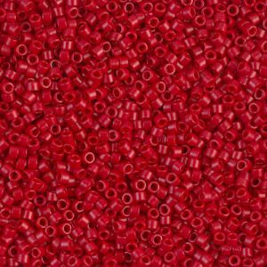 Close-up of small, shiny red beads densely packed together.