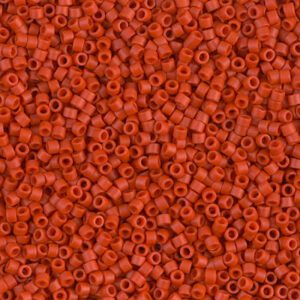 Close-up of many small red cylindrical beads.
