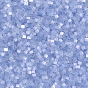 Close-up of small, translucent blue cubic crystals.