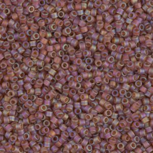 Close-up of small purple and pink cylindrical beads.