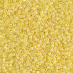 Close-up of small yellow seed beads.