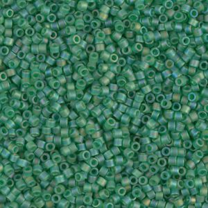A close-up view of numerous small green cylindrical beads.