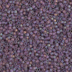 A close-up of numerous small purple beads with a cylindrical shape.