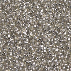 Close-up of numerous small, translucent beads with silver linings.