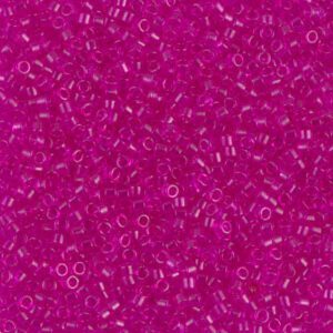 Close-up of small, translucent pink beads scattered densely.